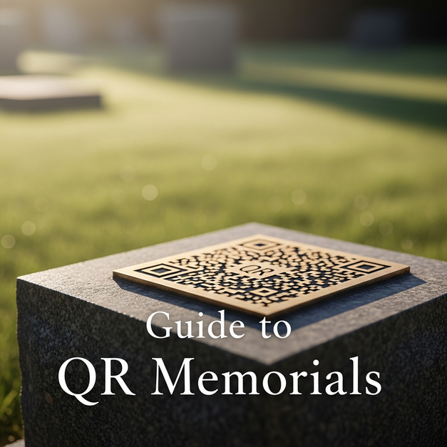 A bronze QR code plaque on a granite headstone in a serene, sunlit garden for a gravesite memorials guide.